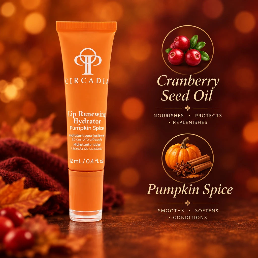 A tube of Circadia Lip Renewing Hydrator Pumpkin Spice lip balm, featuring an orange squeeze tube with white text and a clear cap, set against fall inspired background.