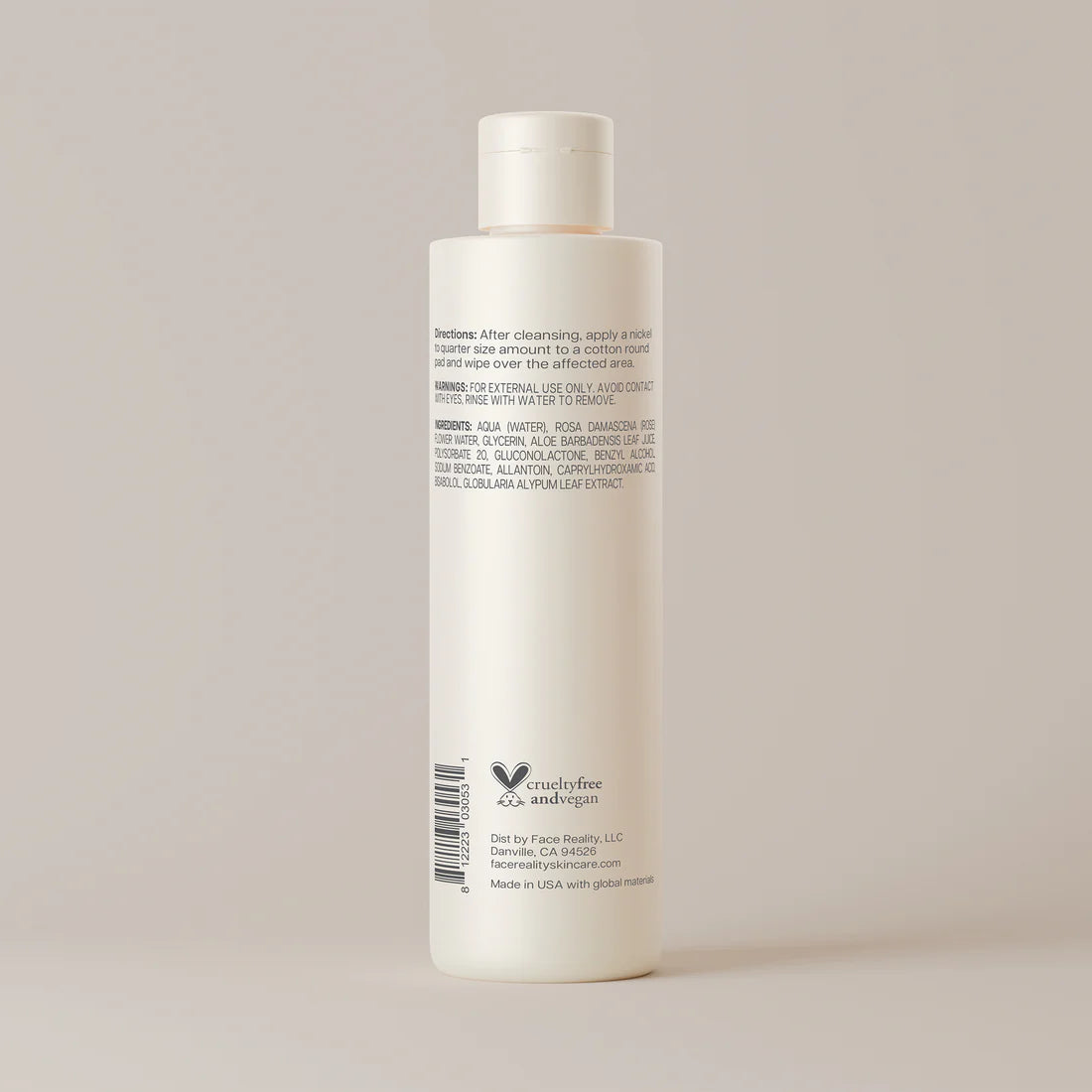 Face Reality Calming Facial Toner white bottle with label on a light gray background