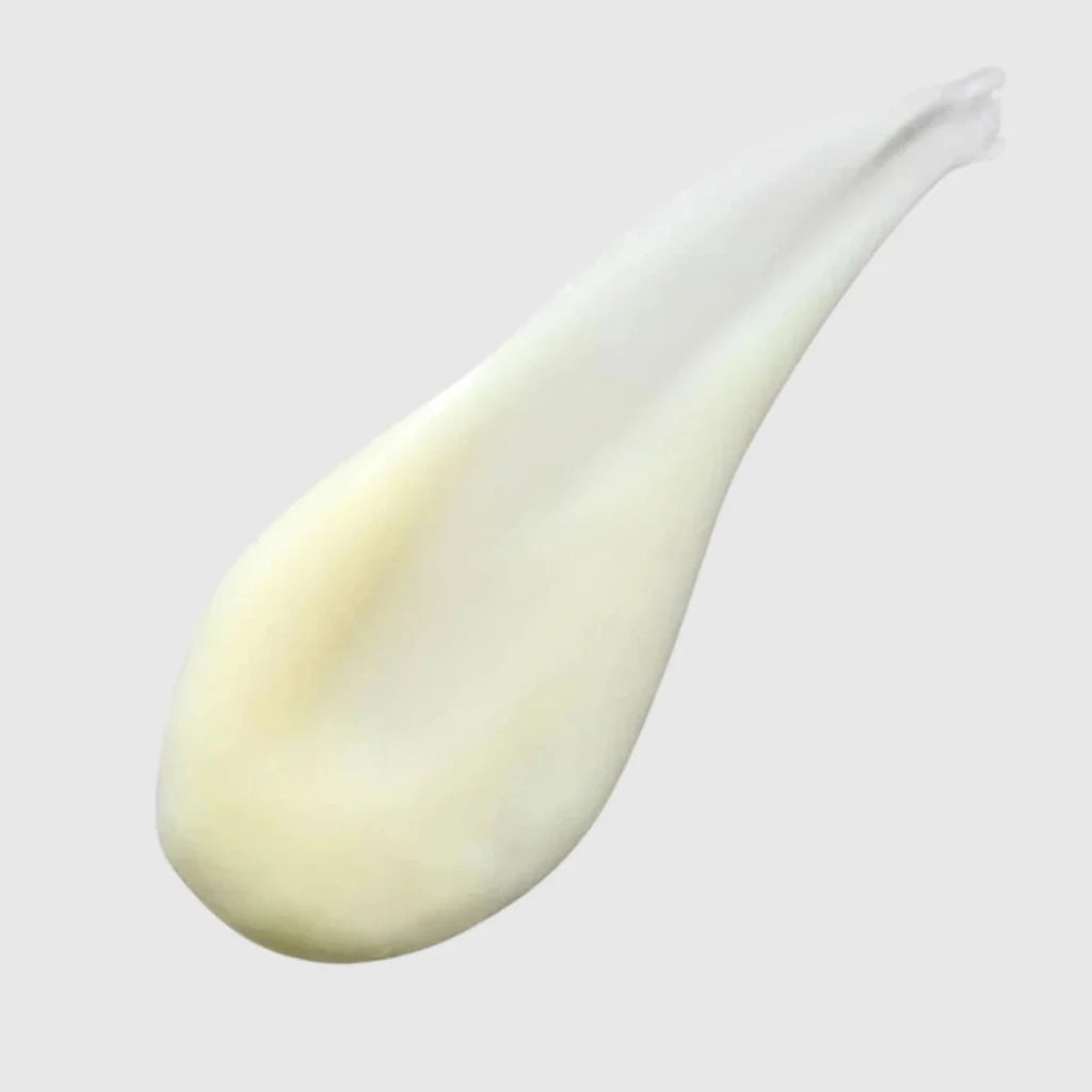 Skin script citrus-C nourishing Cream with pale yellow product smear crossed a light grey background.