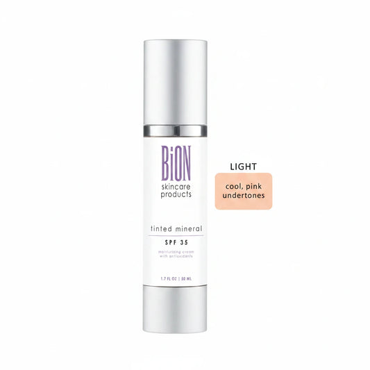 A white cylindrical bottle of BiON tinted mineral SPF 35 skincare cream with purple branding, shown on a white background next to a peach-colored color swatch labeled 'LIGHT cool, pink undertones'.