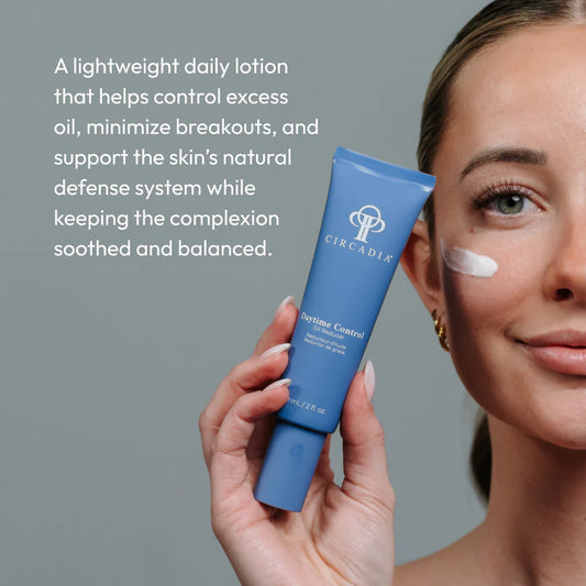 Circadia Drying Control lotion tube held by a hand with text about its benefits on a gray background