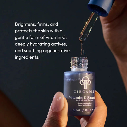 Circadia Vitamin C serum being dripped into a dropper bottle against a dark background.
