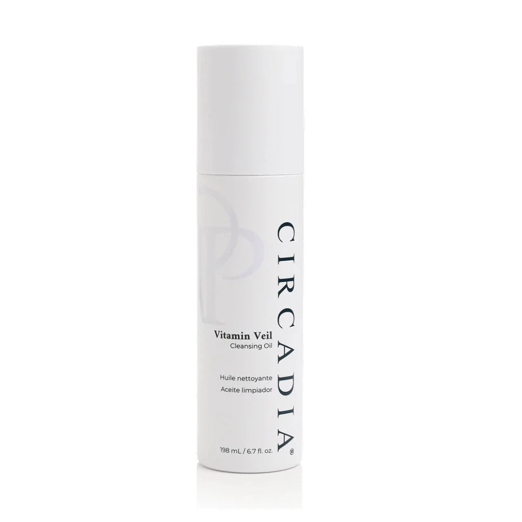 A white cylindrical bottle of Circadia Vitamin Veil Cleansing Oil on a clean white background with a subtle reflection.