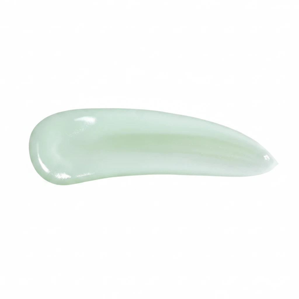 A glossy, smooth smear of pale mint green Clearchoice Urban Shield cream or gel on a solid white background.