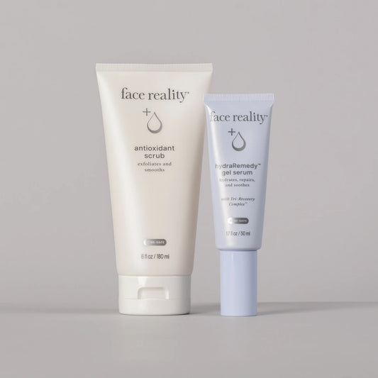 Two skincare products from 'face reality' on a gray background