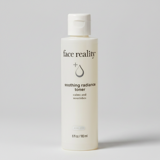 Bottle of 'face reality' soothing radiance toner on a white background