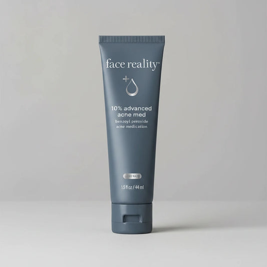Tube of 'face reality' 10% advanced acne med on a beige background