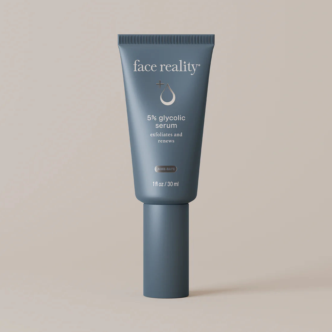Face_Reality_5%_Glycolic_serum in blue tube on a light beige background