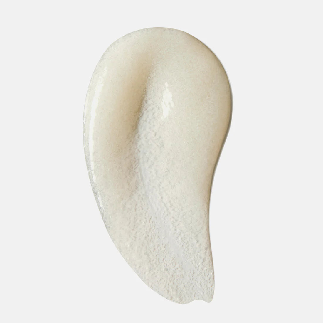 Face Reality Antioxidant Scrub Close-up of a smooth, beige-colored cream on a white background