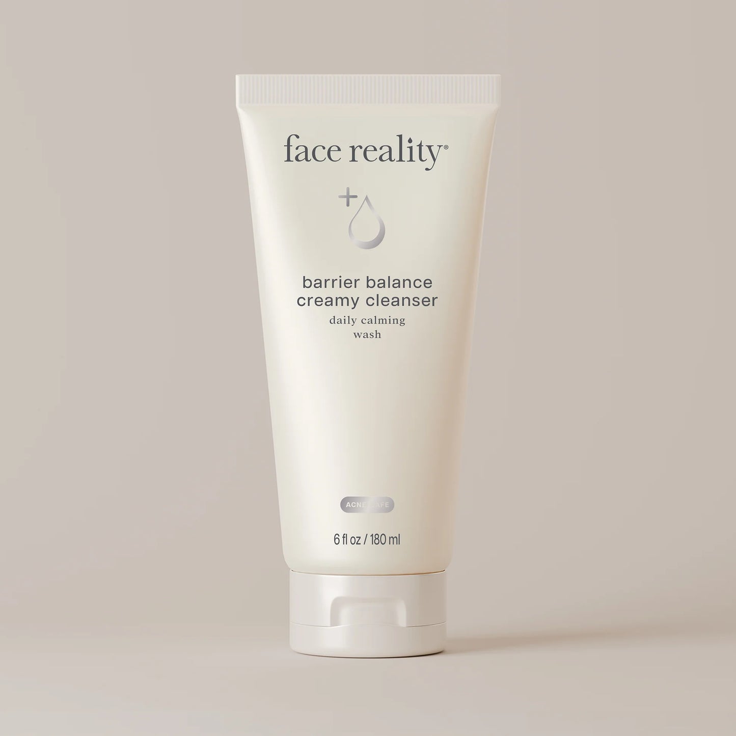 Tube of 'face reality' barrier balance creamy cleanser on a light background