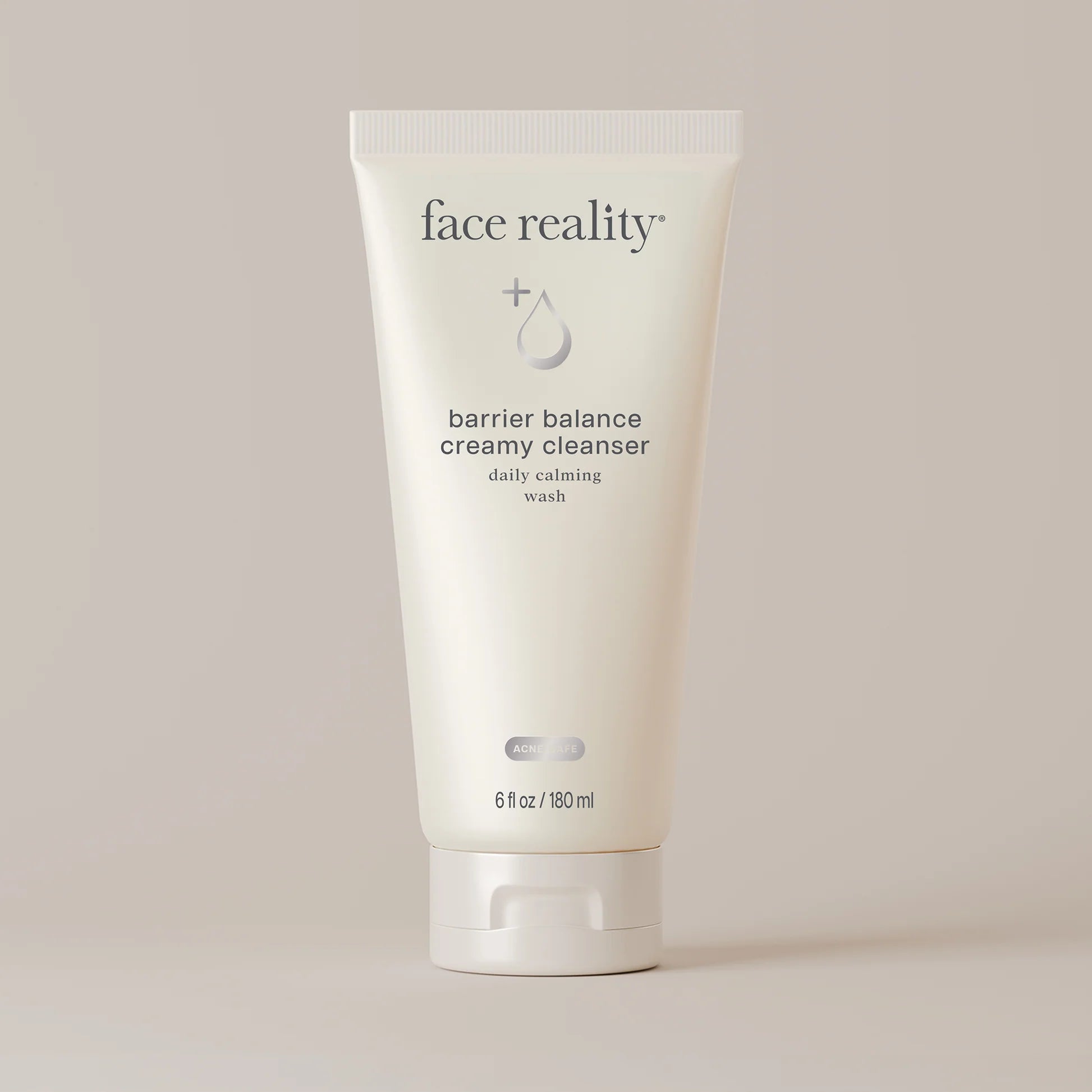 Tube of 'face reality' barrier balance creamy cleanser on a light background
