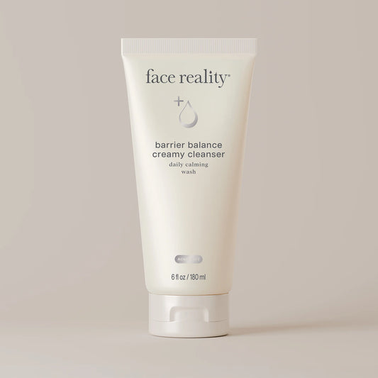 Tube of 'face reality' barrier balance creamy cleanser on a light background