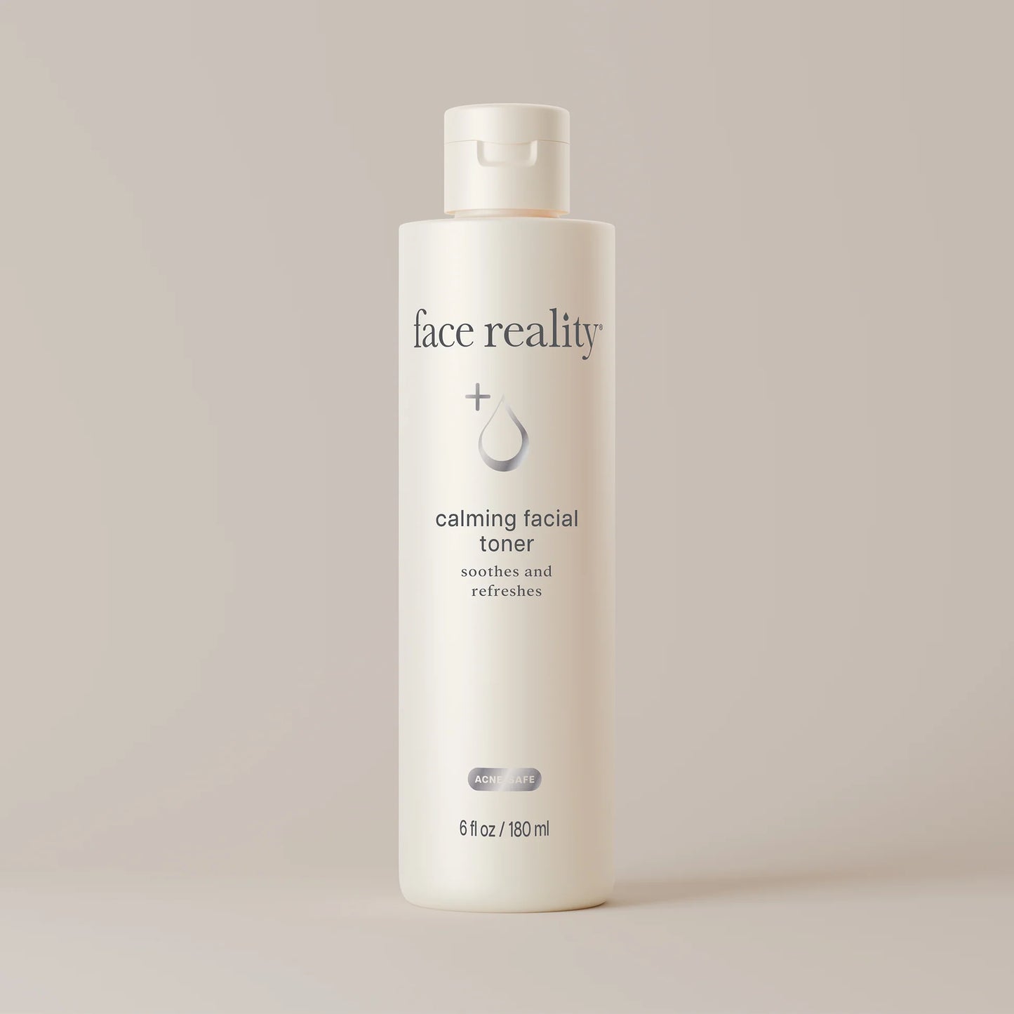 Bottle of 'face reality' calming facial toner on a light background