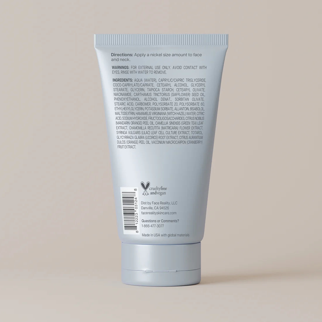 Back label of a ClearDerma product tube on a beige background