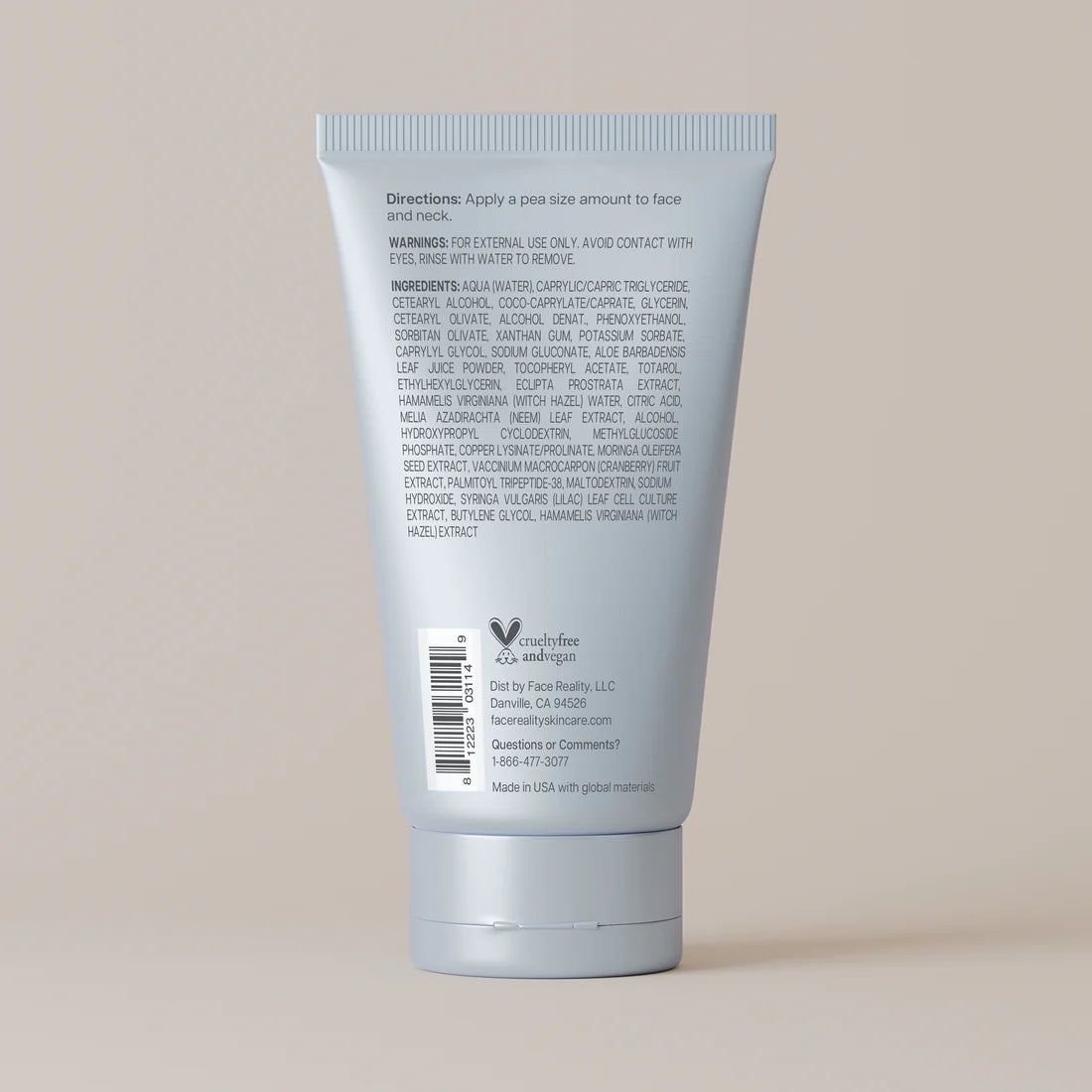 Back view of a skincare product tube with text on a beige background