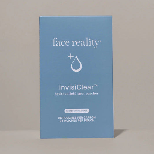 Blue box of face reality invisiclear hydrocolloid spot patches on a gray background