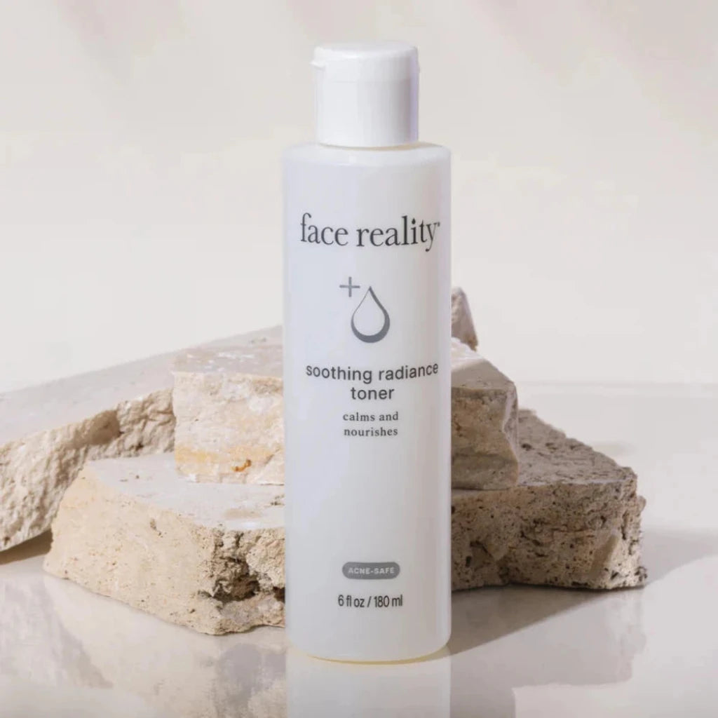 Bottle of 'face reality soothing radiance toner' on a neutral background