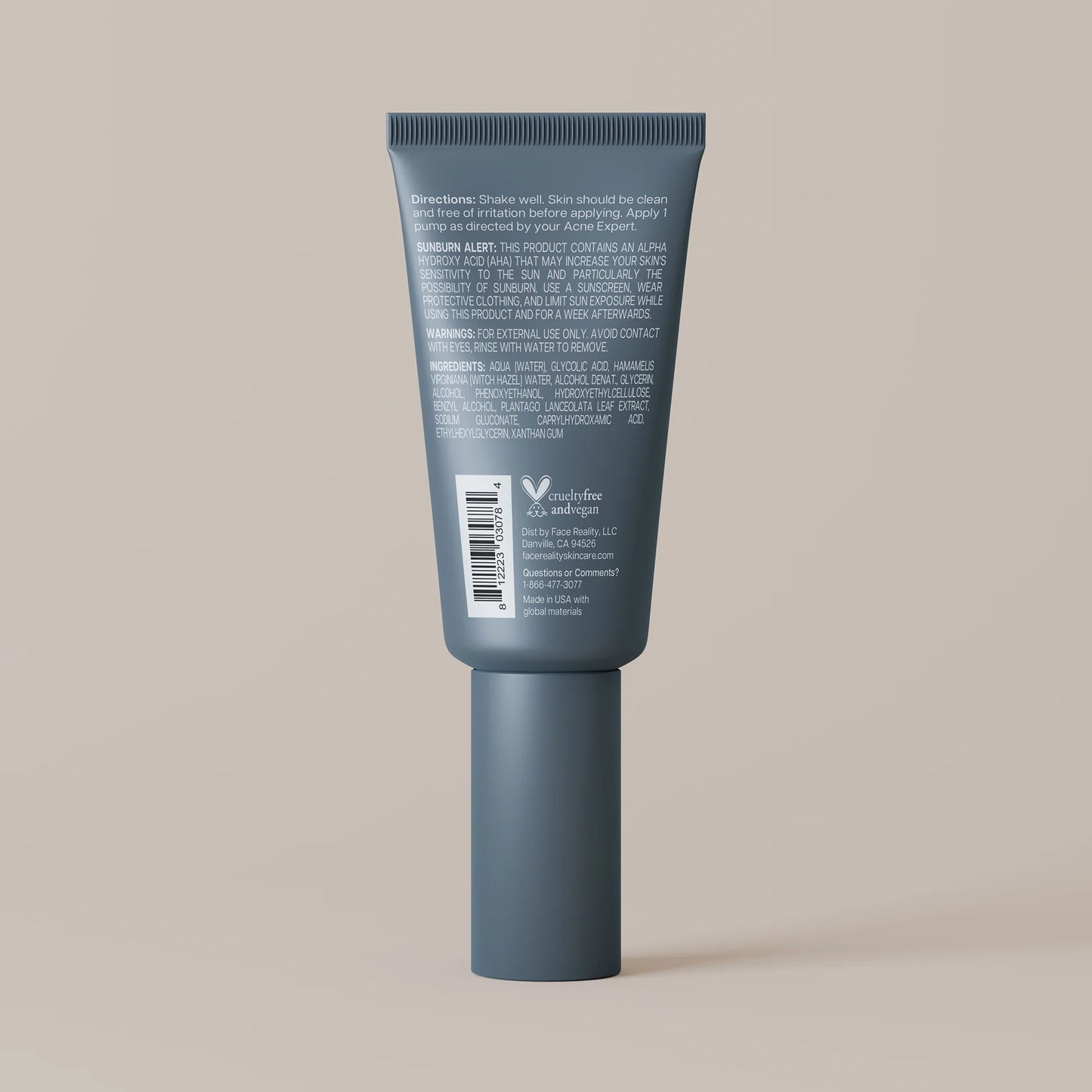 Blue skincare tube with text and a barcode on a beige background