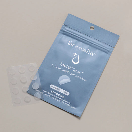 Blue package of face reality invisiclear patches on a beige background