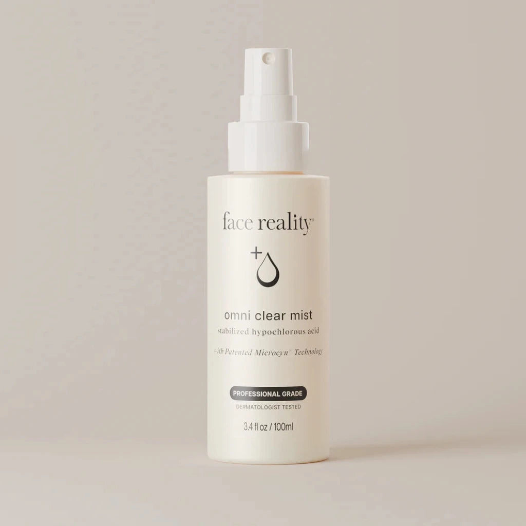 Face Reality Omni Clear Mist pump bottle on a light beige background