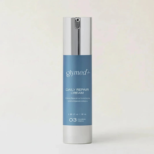 Glymed plus Daily Repair Cream bottle on a light gray background