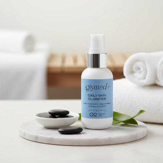 Glymed Plus Daily Skin Clarifier bottle on a light background