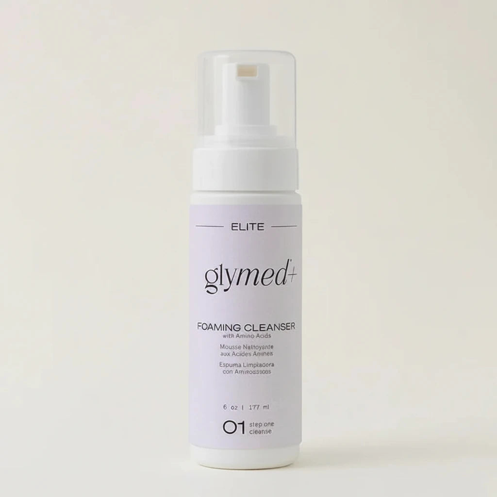 Glymed Plus Foaming Cleanser bottle on a light beige background