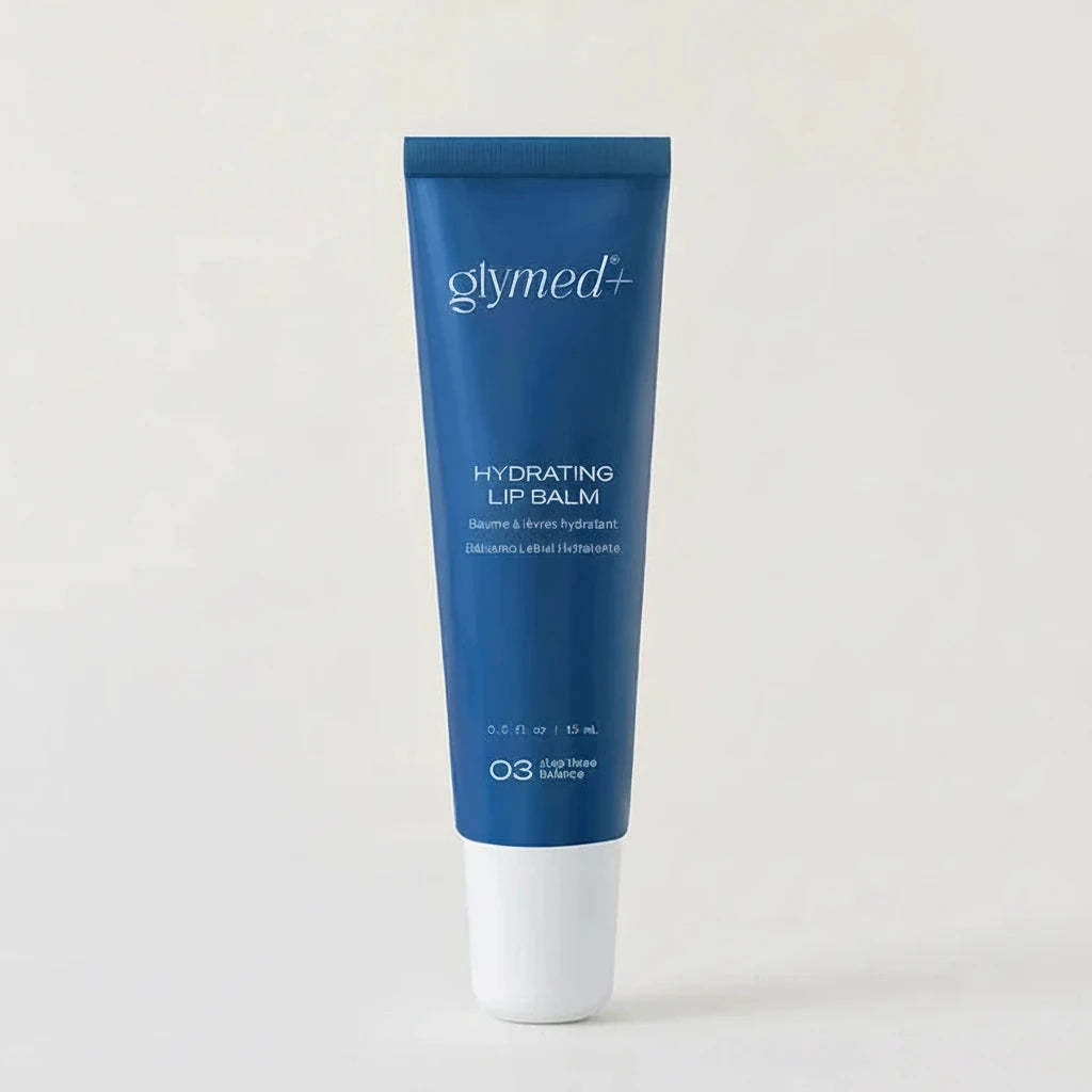 Blue lip balm tube labeled 'glymed plus hydrating lip balm' on a white background