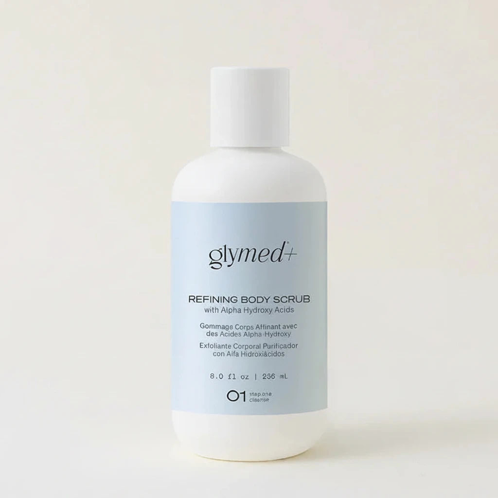 Glymed Plus refining body scrub bottle on a light background