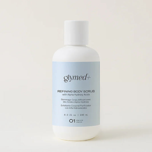 Glymed+ refining body scrub bottle on a light background