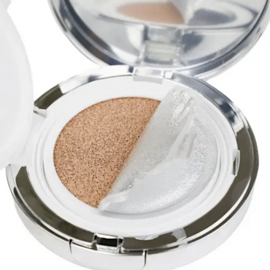 HOP open Volume Cushion Shield compact with two shades of powder and a puff on a white background