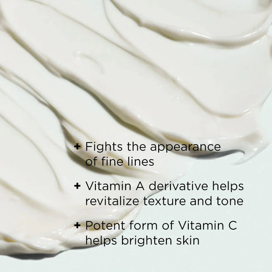 White cream being spread on a white surface with text about skincare benefits.