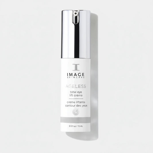 Image Skincare Ageless Total Eye Lift Crème in a white bottle with a reflective silver cap, shown on a clean white background with a soft shadow.