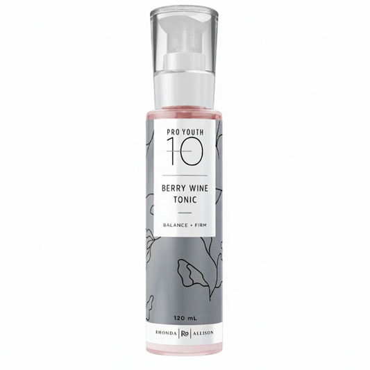 Bottle of Pro Youth 10 Berry Wine Tonic on a white background