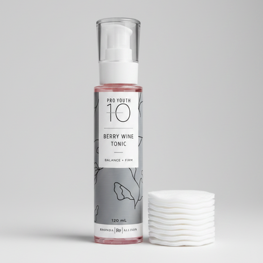 Bottle of Pro Youth 10 Berry Wine Tonic on a white background