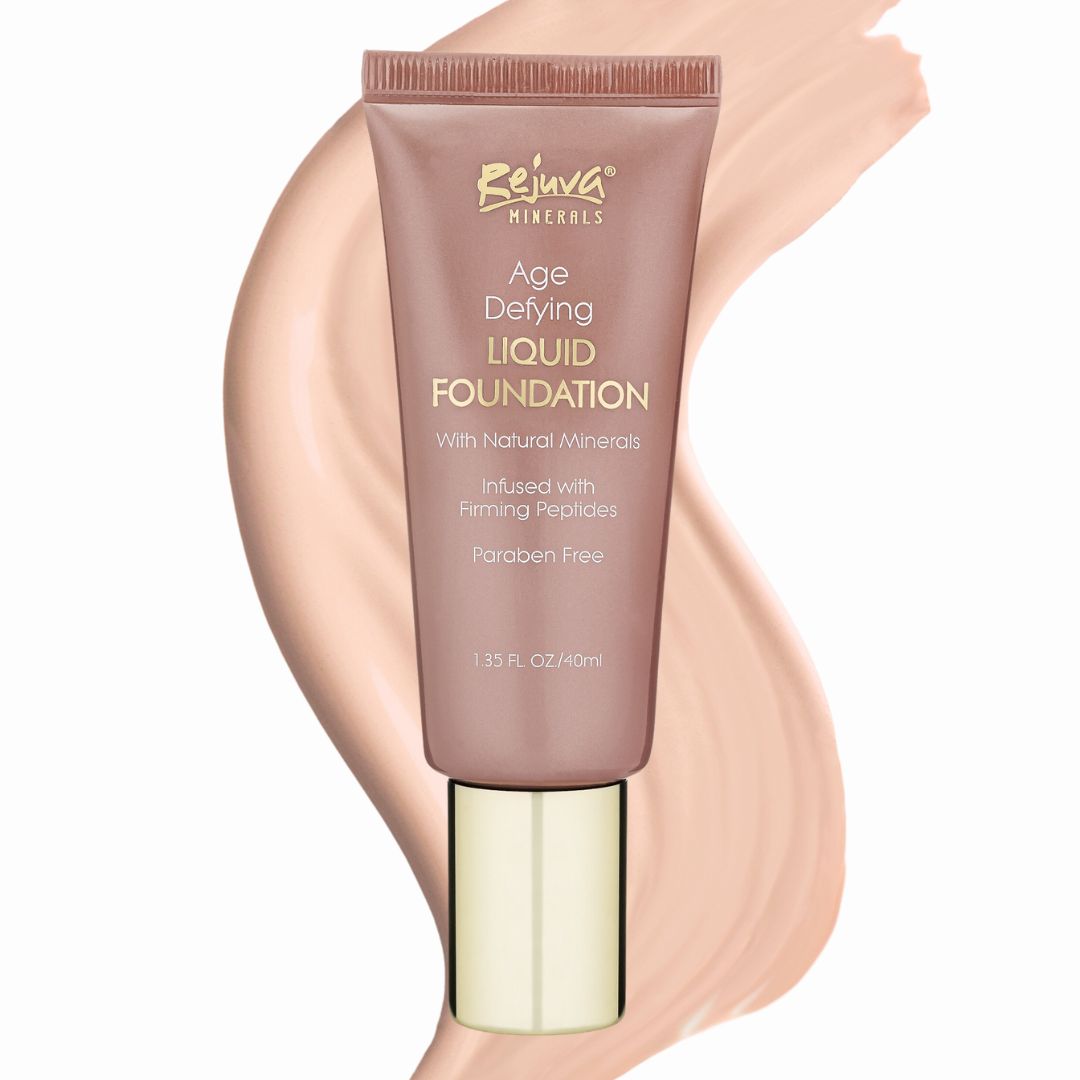 Rejuva  Minerals Age Defying Liquid Foundation bottle with a swatch of foundation color on a white background