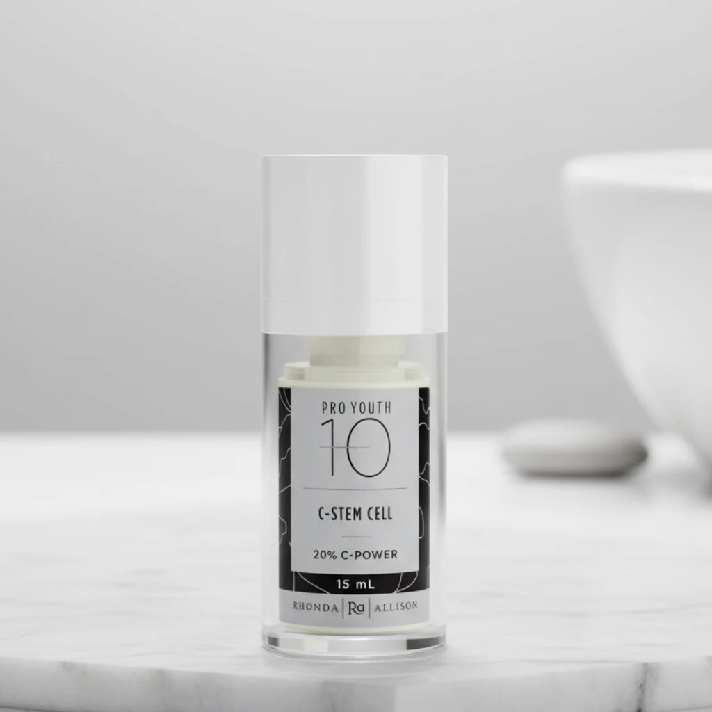 Skincare serum bottle labeled 'Pro Youth 10 C-Stem Cell' by Rhonda Allison on a light grey counter background