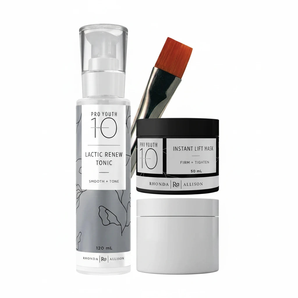 Rhonda Allison Pro Youth 10 skincare set with Lactic Renew Tonic, Instant Lift Mask, and applicator brush on a light gray background.