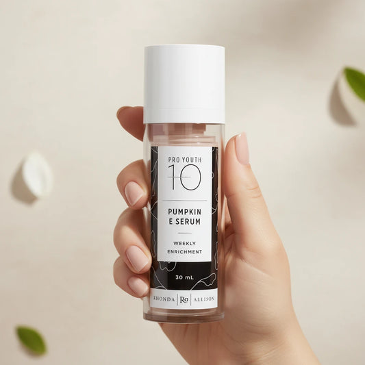 Bottle of Pro Youth 10 Pumpkin E Serum with a white cap on a white background