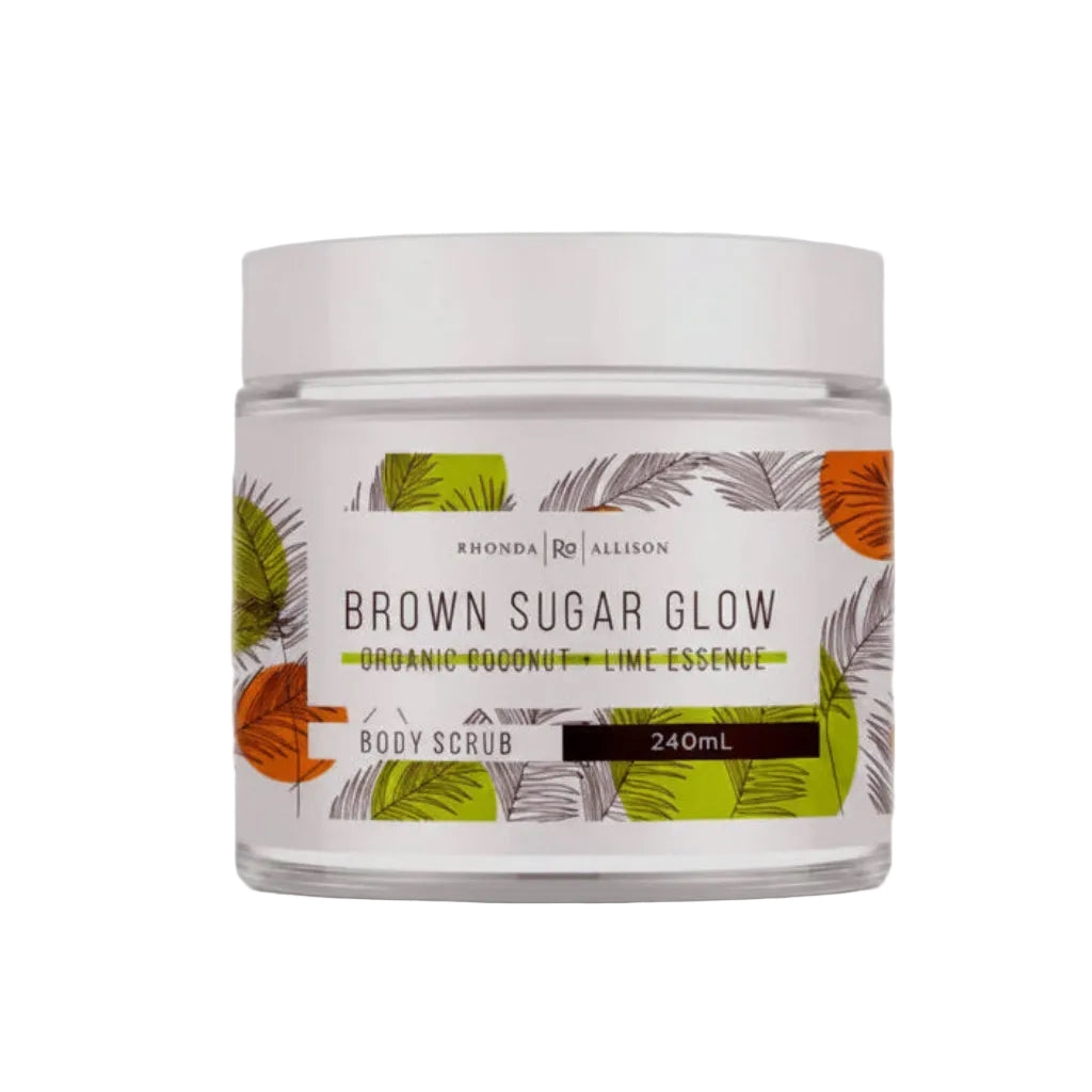 Jar of 'Brown Sugar Glow' body scrub with leaf design on a white background