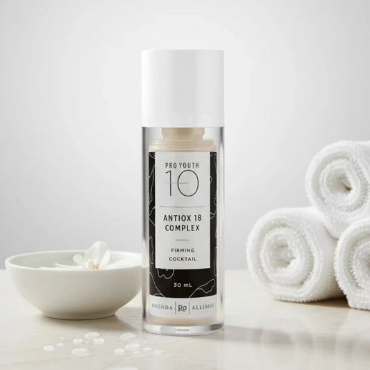 Skincare bottle labeled 'Pro Youth 10 Antiox 18 Complex' on a white background