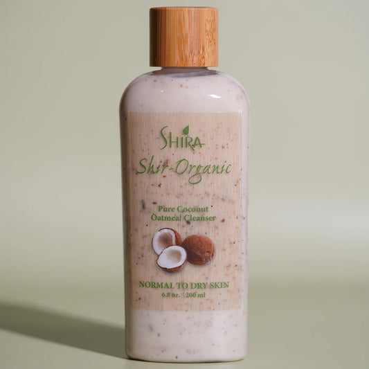 Shira Organic Pure Coconut Oatmeal Cleanser bottle on a light green background