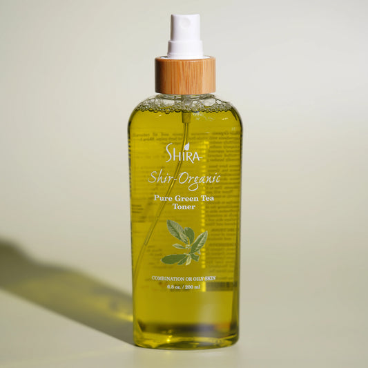 Shira Shir-Organic Pure Green Tea Toner bottle on a beige background