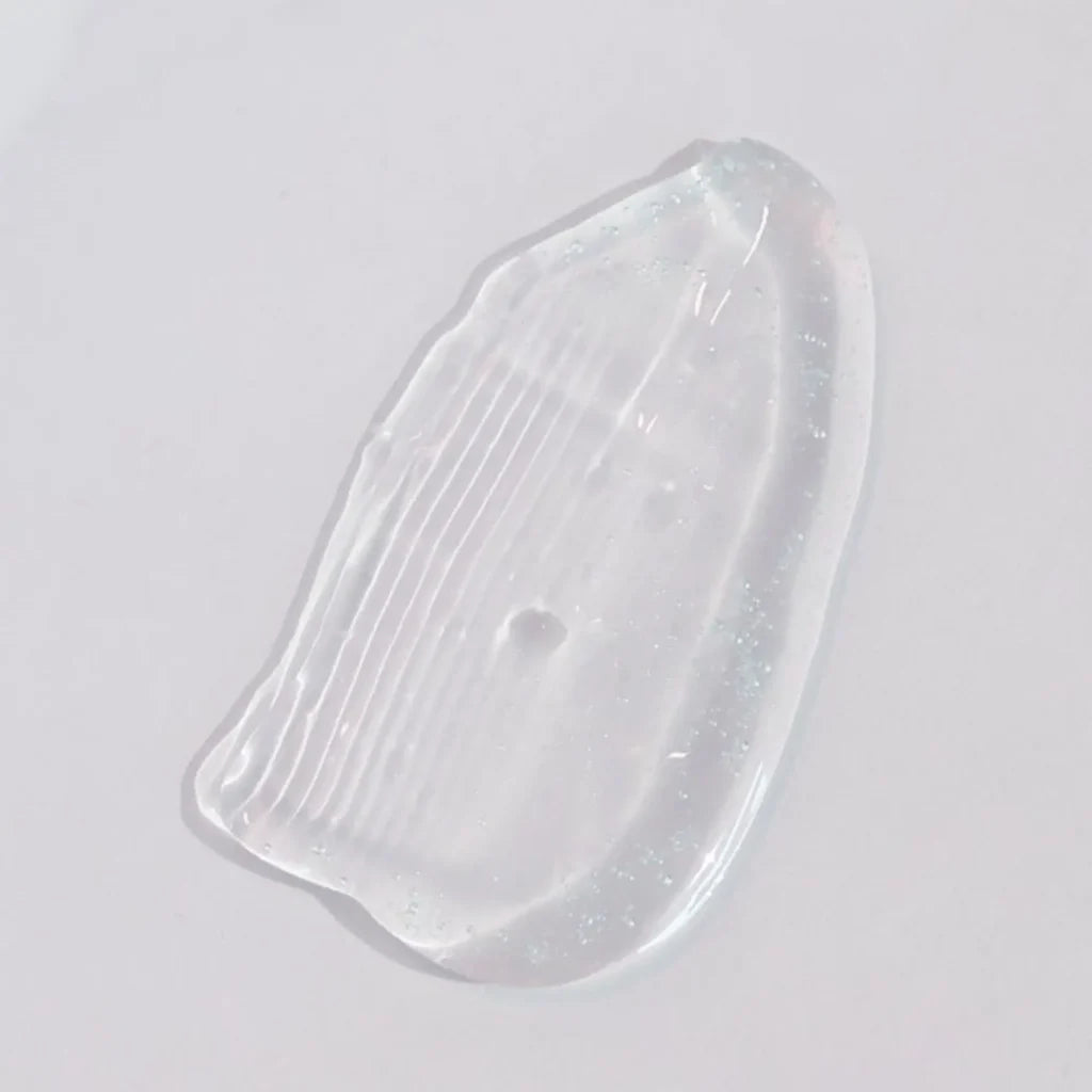 Skin Script Ageless Lip Smear on a light grey background