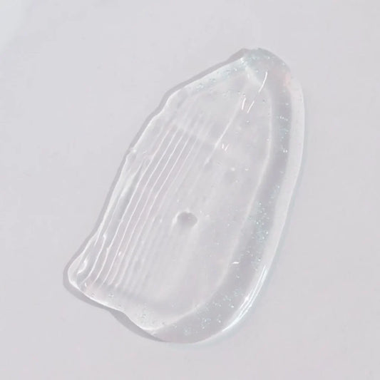 Skin Script Ageless Lip Smear on a light grey background