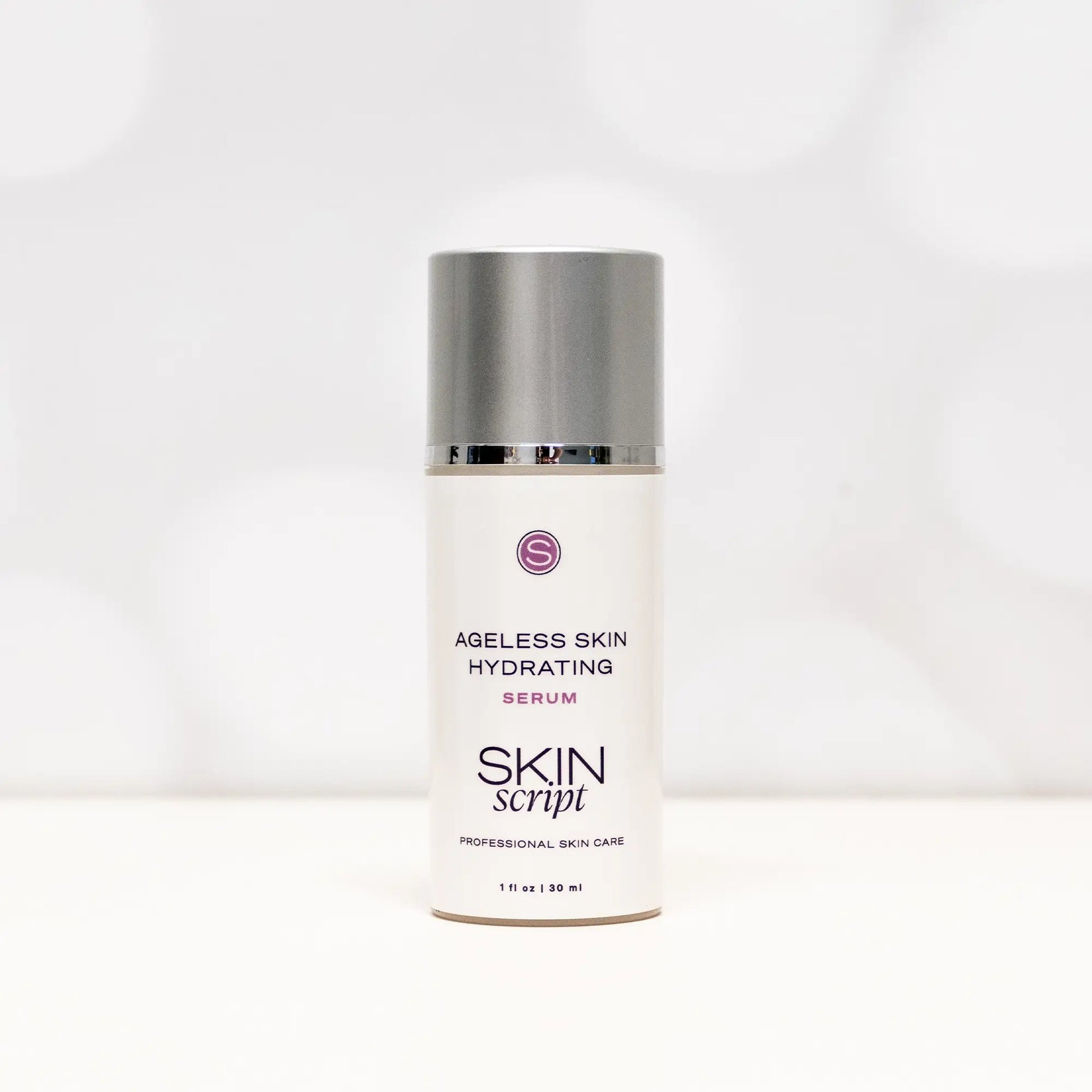 Cylinder bottle of Skin Script Ageless Skin Hydrating Serum 1oz on a light grey background