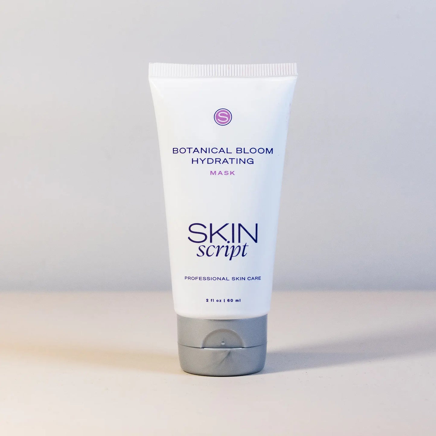 Skin Script Botanical Bloom Hydrating Mask tube on a light grey background