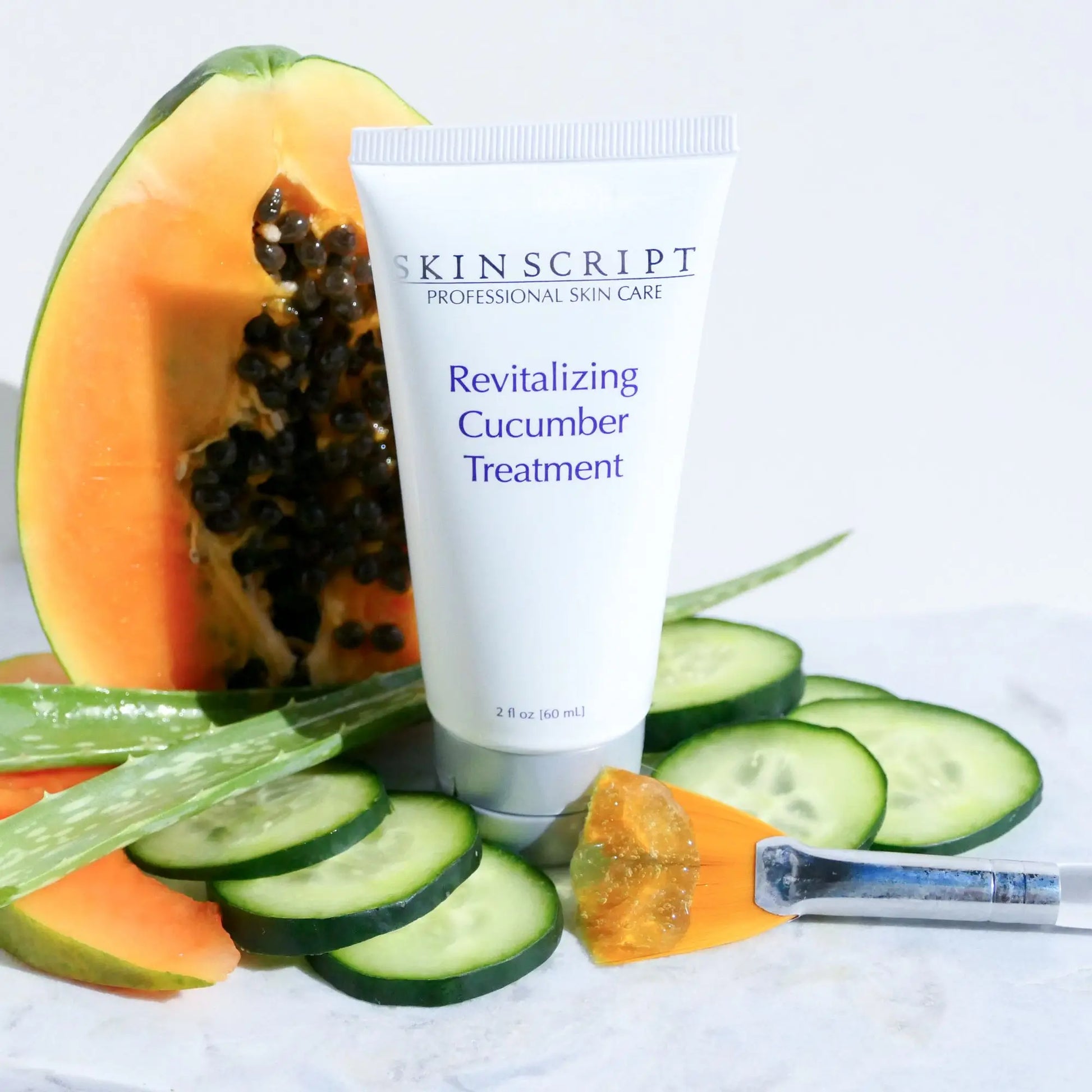 Skin Script Revitalizing Cucumber Scrub Treatment tube with purple lettering
