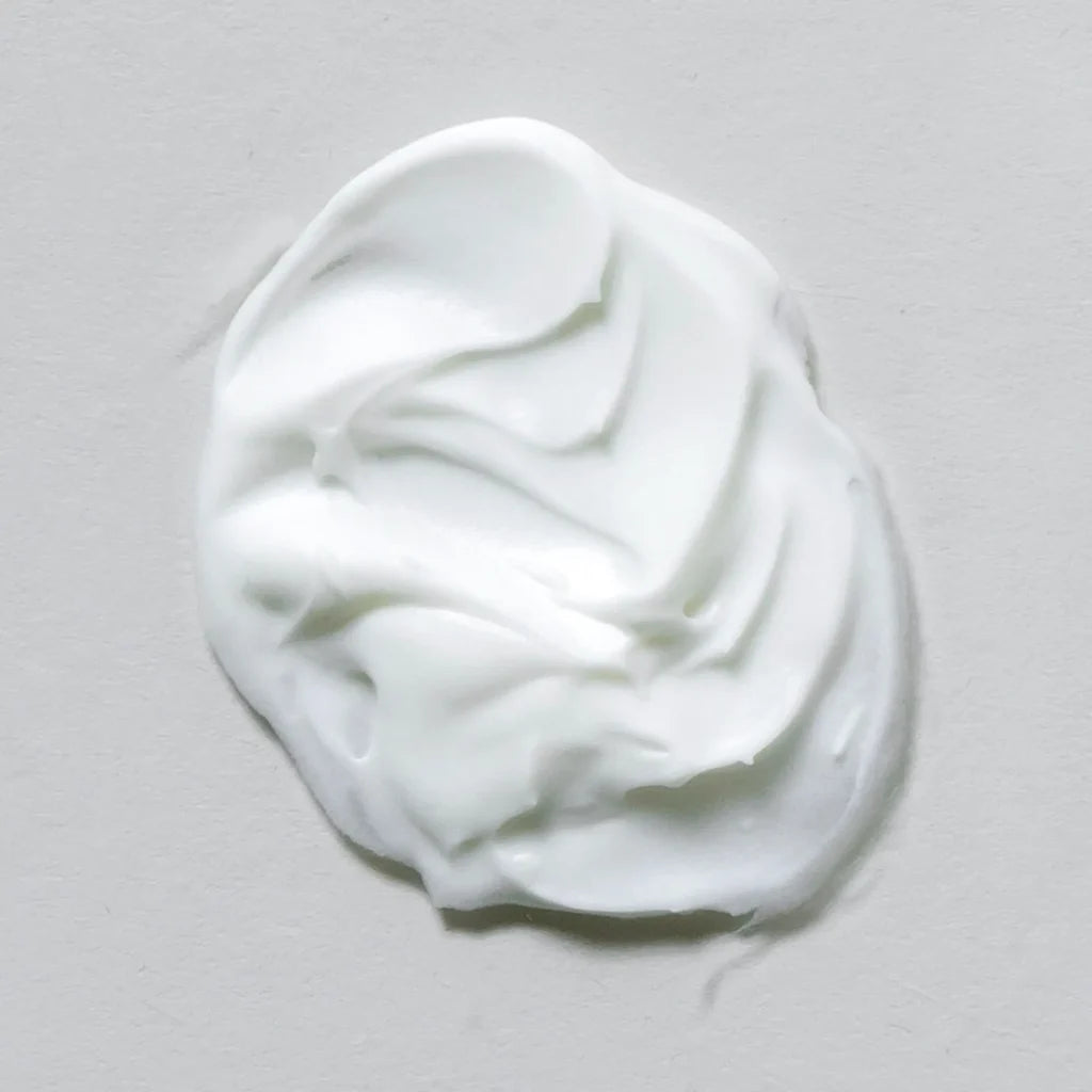 Smear of Skin Script Sheer Protection SPF 30 on grey background