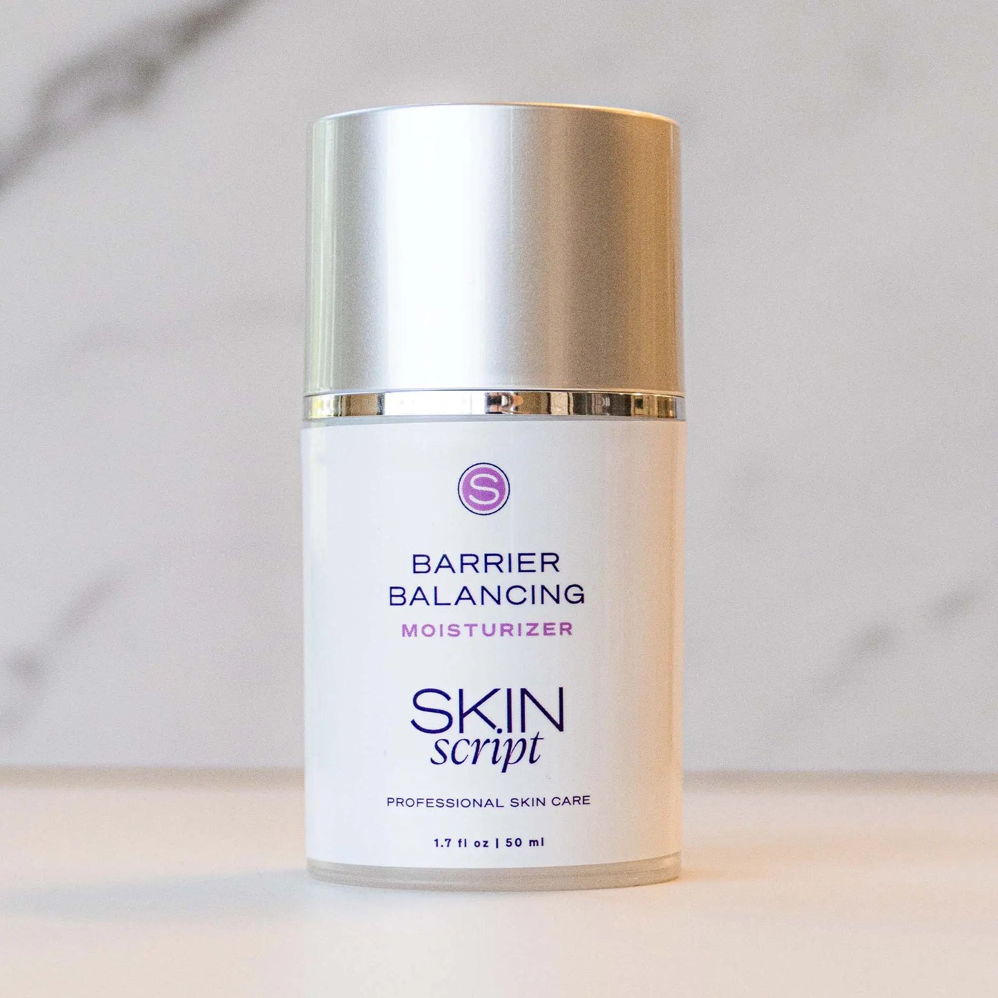 Skin Script barrier balancing moisturizer 1.7oz. pump bottle on a light grey background